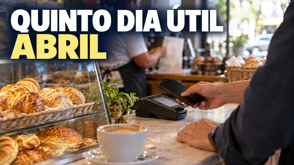 Quinto dia útil de abril: pagamento pelo celular no balcão da padaria, de manhã.